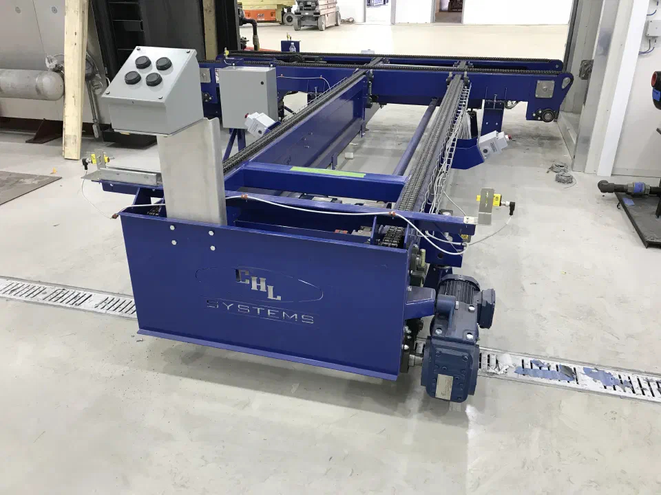 A conveyor section with its drive and control enclosure during build