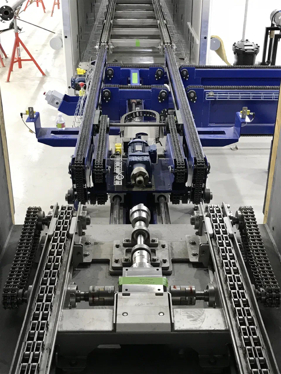 The power take-off drive and transfer at the chamber entrance, which keeps every powered part outside the hazardous area