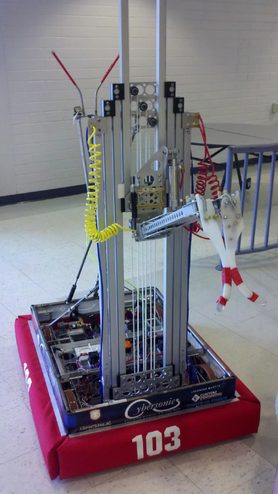 FRC 103's 2011 robot, with its elevator mast and front manipulator
