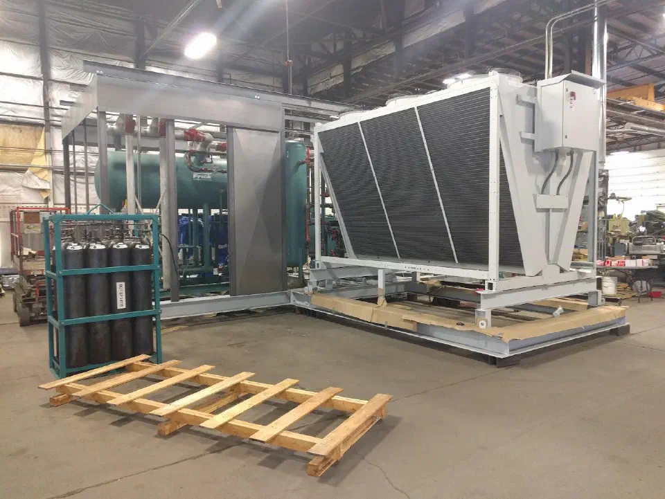 The refrigeration skid and enclosure assembly in the shop