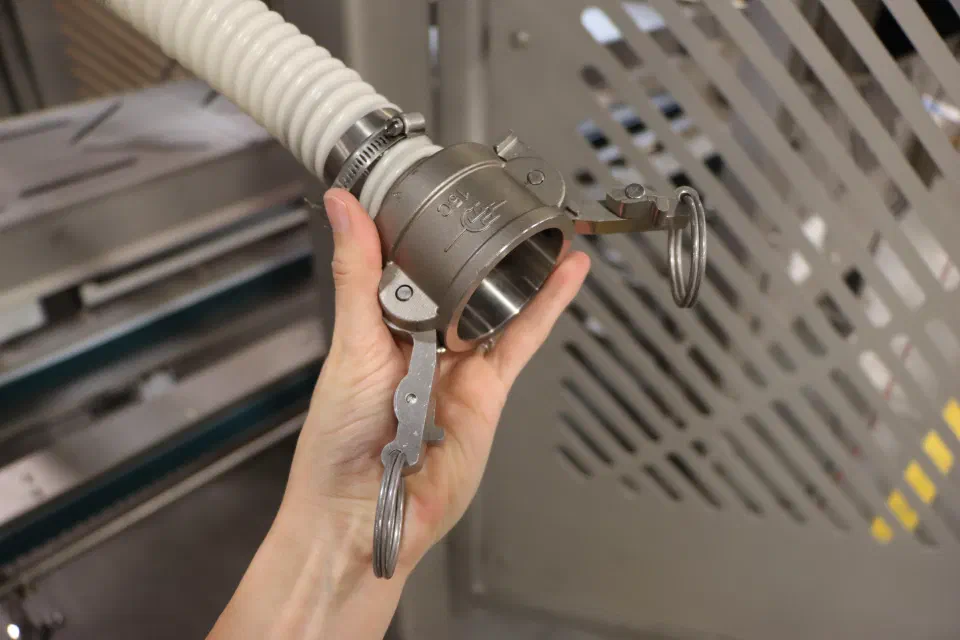 A stainless camlock coupling in the vacuum piping