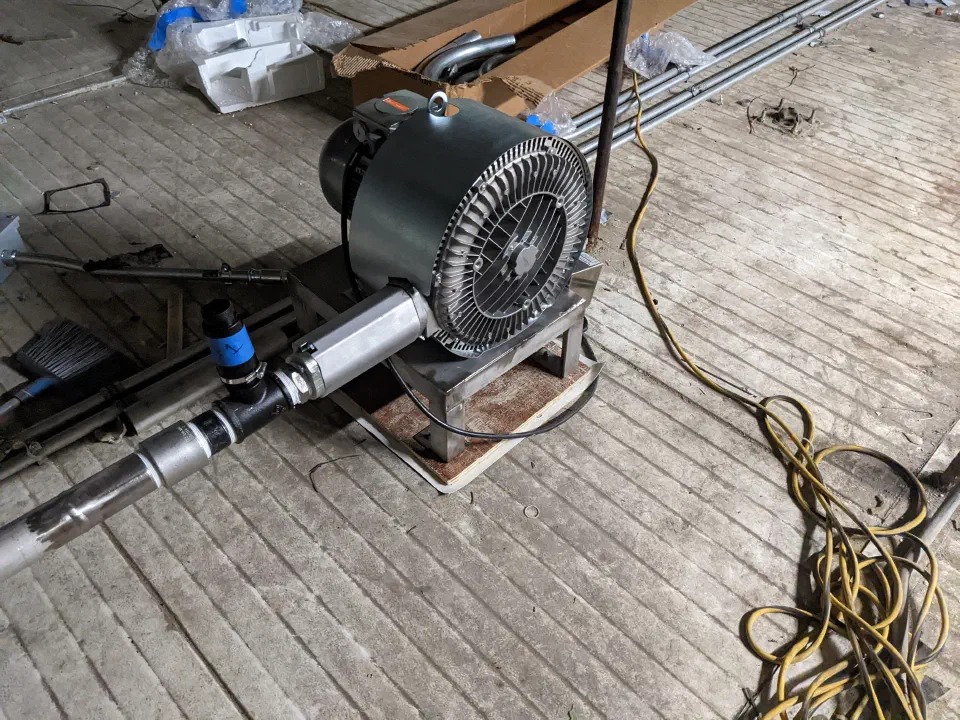 The side-channel blower that supplies vacuum to the robots' pick tools