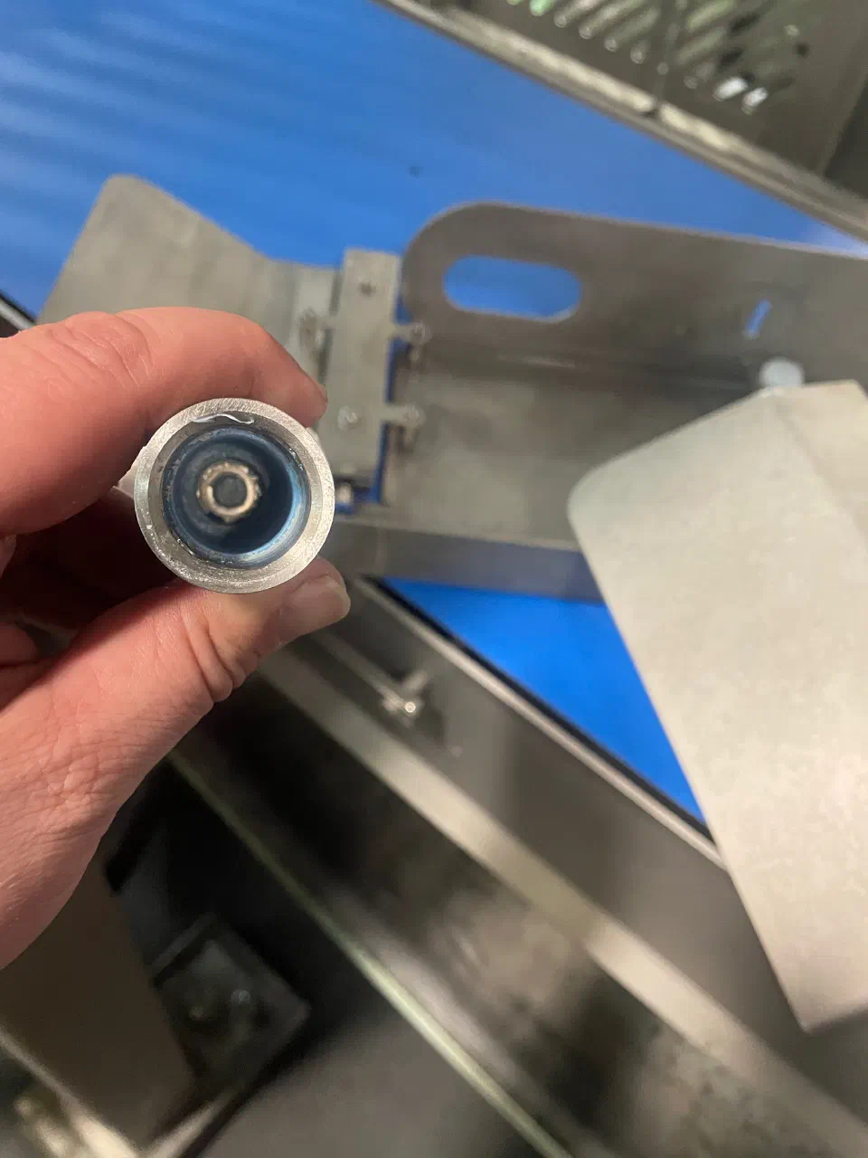 The disassembled tool stem showing where the bushing failed