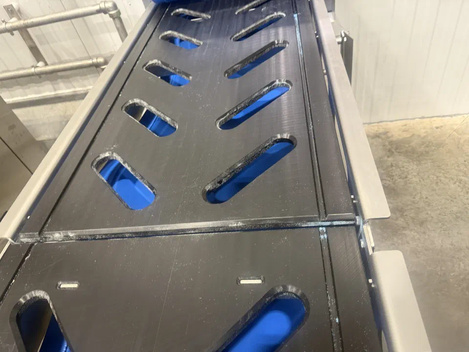 Bed plate cutouts on a replacement belt, showing a positioning issue